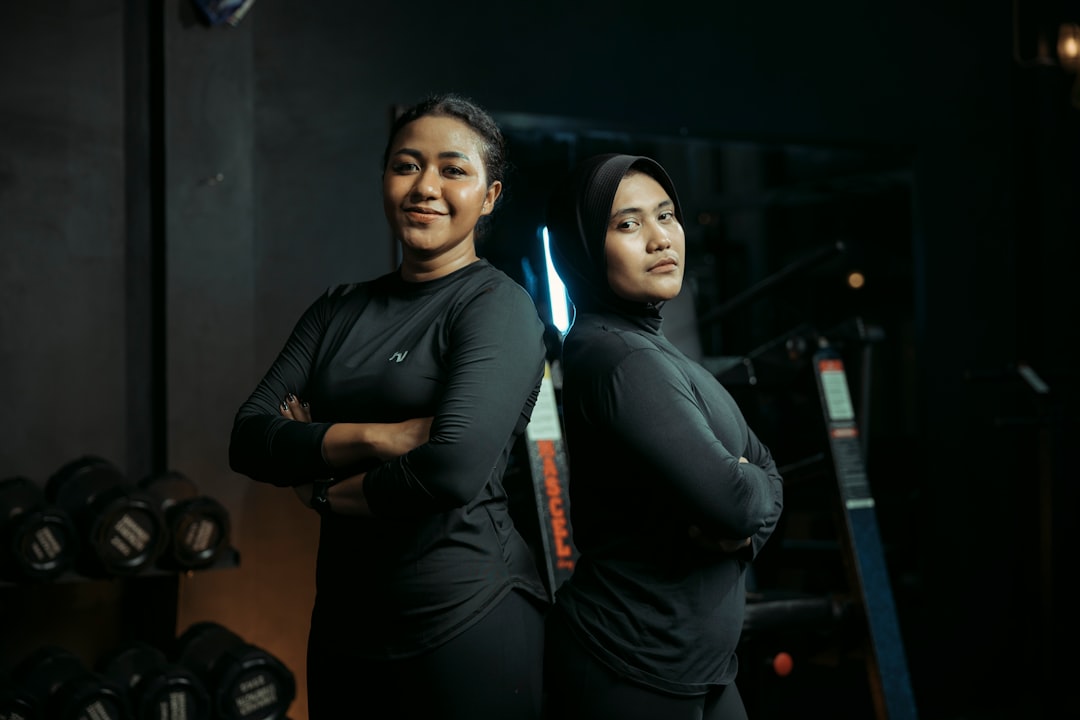 Friendly competition health - workout partners in a gym