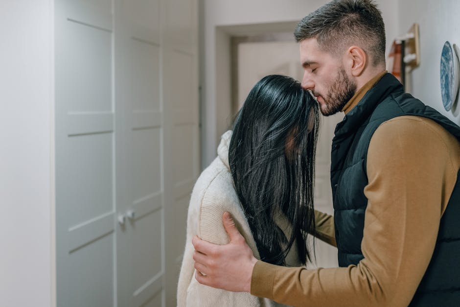 mindfulness for social anxiety - A couple shares a tender, intimate moment indoors, showcasing genuine emotion.