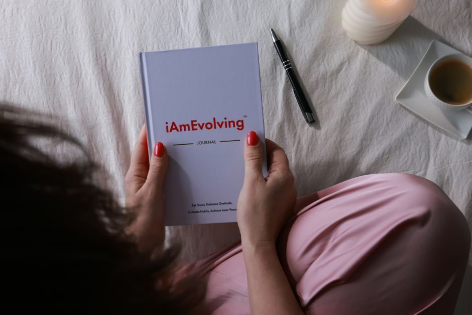 5 minute journaling prompts - A serene morning routine featuring journaling with a candle and coffee.