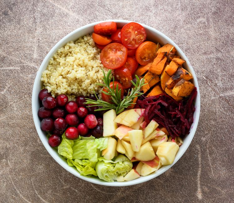 mental wellness news - A vibrant Buddha bowl filled with quinoa, fresh fruits, and vegetables. Perfect for a healthy meal plan.
